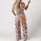 🌼 50% RABATT ☀️ | Ärmlös Jumpsuit med Blommönster – Hög midja & Vida Ben